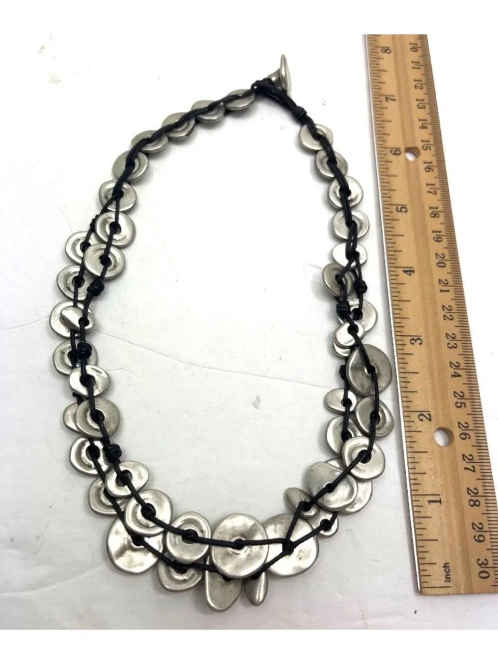 Uno De 50 Button Closure Necklace With Layered Silver-Tone Discs And Black Cord
